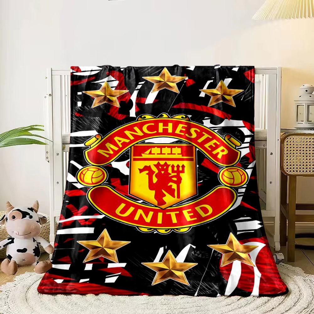 A Manchester United logo surrounded by gold stars on a red-black pattern. for all seasons blanket lunch break throw gift 80cm x 120cm
A Manchester United logo surrounded by gold stars on a red-black pattern. for all seasons blanket lunch break throw gift 80cm x 120cm