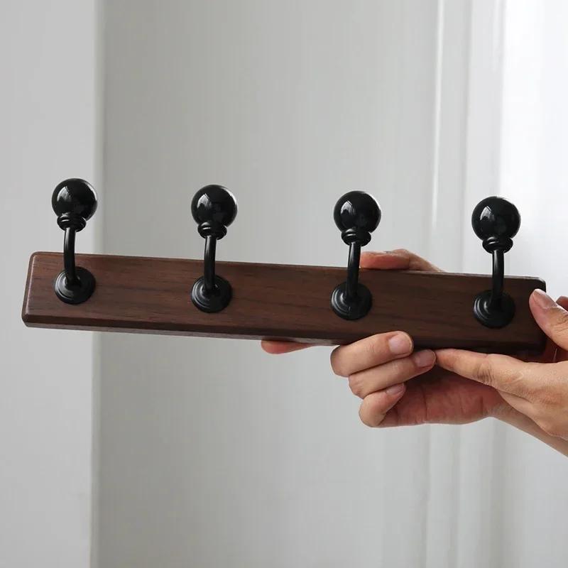 Walnut Wood Bending Hooks Clothing Hat Hook Wall-mounted Storage Hanging Hooks Wall Storage Holder Multiple Decorative Shelves чорний
Walnut Wood Bending Hooks Clothing Hat Hook Wall-mounted Storage Hanging Hooks Wall Storage Holder Multiple Decorative Shelves чорний