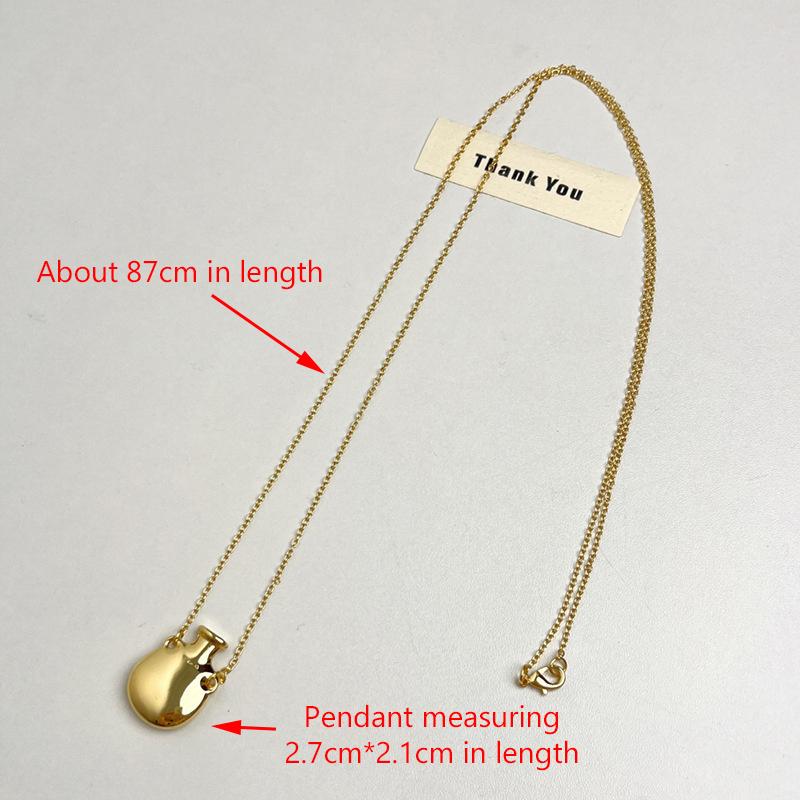 Простая новинка, металлическая маленькая ваза, кулон, длинное ожерелье для женщин и девочек, универсальная цепочка для свитера, ювелирные изделия, аксессуары, подарки 87*2.7*2.1cm золотой
Простая новинка, металлическая маленькая ваза, кулон, длинное ожерелье для женщин и девочек, универсальная цепочка для свитера, ювелирные изделия, аксессуары, подарки 87*2.7*2.1cm золотой