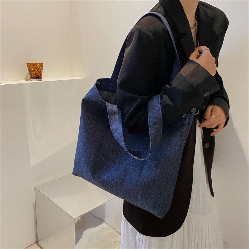 Denim canvas bag large capacity class college students loading books ins Korean commuting out portable shoulder canvas bag
Denim canvas bag large capacity class college students loading books ins Korean commuting out portable shoulder canvas bag