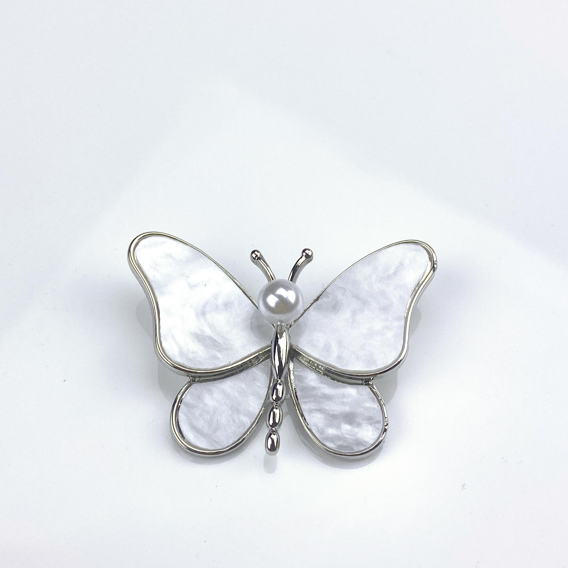 Butterfly Brooch with Mother of Pearl Inlay and Faux Pearl Accent Silver Tone Metal Pin for Clothing Accessories
Butterfly Brooch with Mother of Pearl Inlay and Faux Pearl Accent Silver Tone Metal Pin for Clothing Accessories
