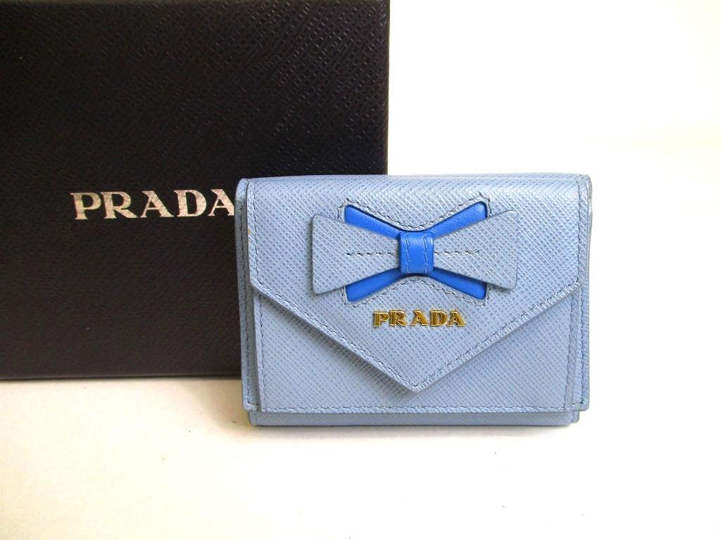 Автентичний світло-блакитний шкіряний гаманець PRADA зі стрічкою в три складки Компактний гаманець №a233 відремонтований
Автентичний світло-блакитний шкіряний гаманець PRADA зі стрічкою в три складки Компактний гаманець №a233 відремонтований