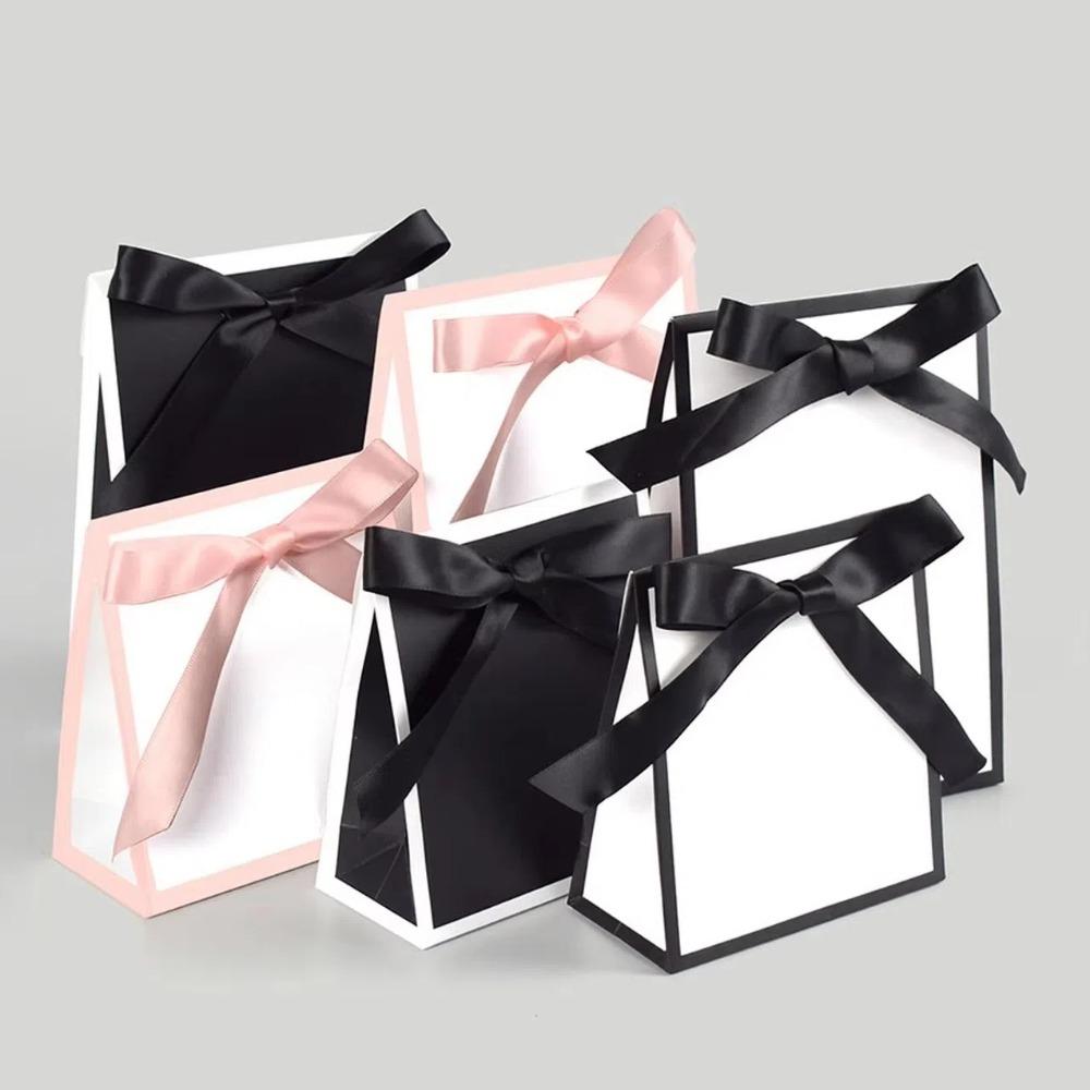 10pcs Black and White Bow Ribbon Gift Bags Cardboard Paper Silk Scarf Handbag Birthday Gift Bags pink-L
10pcs Black and White Bow Ribbon Gift Bags Cardboard Paper Silk Scarf Handbag Birthday Gift Bags pink-L