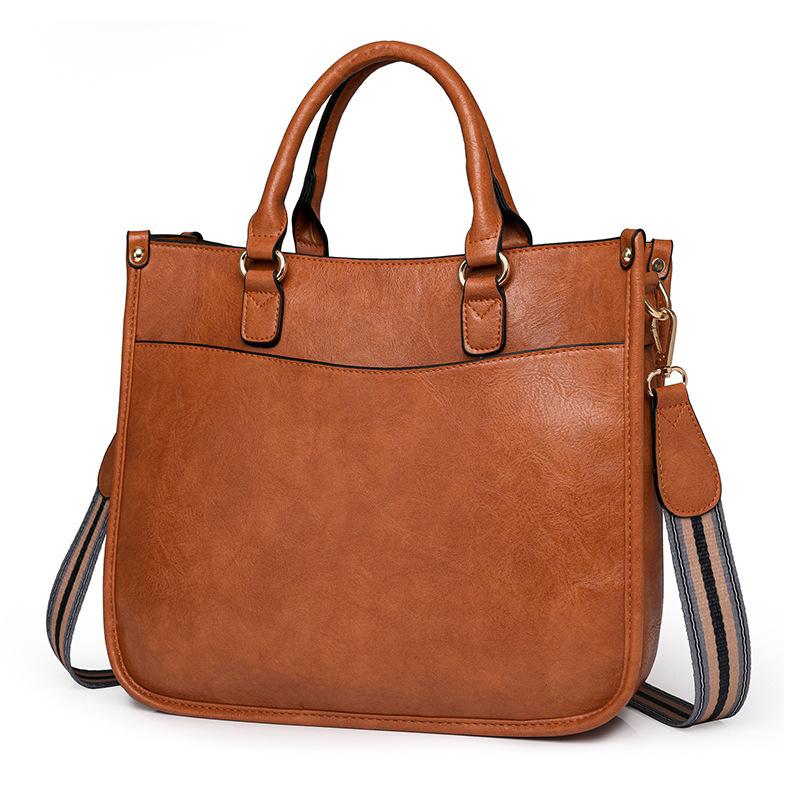 Bag women s new casual retro handbag women s briefcase shoulder messenger bag коричневий
Bag women s new casual retro handbag women s briefcase shoulder messenger bag коричневий