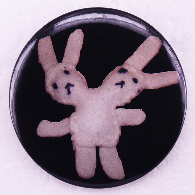 Double-Headed Rabbit Plush Doll with Tinplate Badge
Double-Headed Rabbit Plush Doll with Tinplate Badge