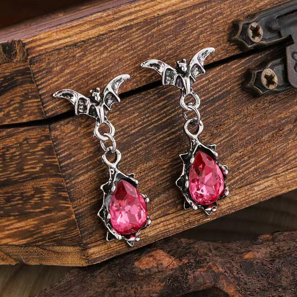 Retro Bat Dangle Earrings with Crystals - Halloween Fashion Accessory
Retro Bat Dangle Earrings with Crystals - Halloween Fashion Accessory