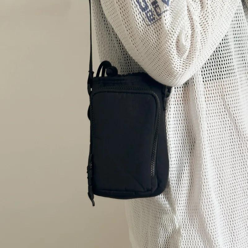 Single shoulder kettle bag, phone bag, waterproof yoga bag, sports outdoor portable bag, drawstring slanted back small bag чёрный
Single shoulder kettle bag, phone bag, waterproof yoga bag, sports outdoor portable bag, drawstring slanted back small bag чёрный