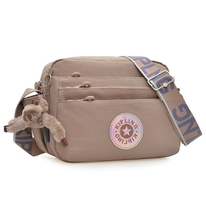 Nylon Waterproof Large Crossbody Bag Shoulder Bag Messenger Bag With Monkey Pendant Doll хакі
Nylon Waterproof Large Crossbody Bag Shoulder Bag Messenger Bag With Monkey Pendant Doll хакі