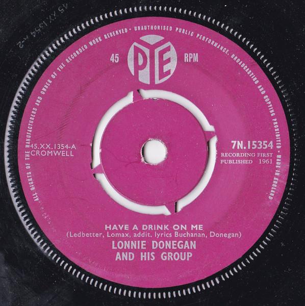 7inch Record LONNIE DONEGAN S SKIFFLE GROUP - Have A Drink On Me 7N15354 Pye Records 1961 UK Rock Used
7inch Record LONNIE DONEGAN S SKIFFLE GROUP - Have A Drink On Me 7N15354 Pye Records 1961 UK Rock Used