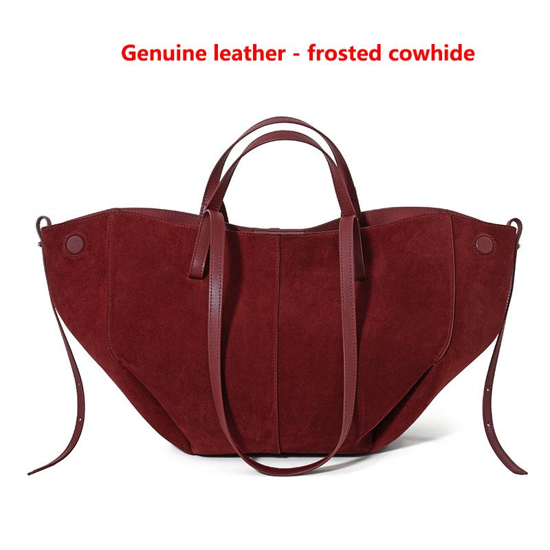 Genuine Leather - Frosted Cowhide Top Layer Cowhide Bag Niche Design Shoulder Bag Large Capacity Commuter Tote Wing Bag 50x15x24cm
Genuine Leather - Frosted Cowhide Top Layer Cowhide Bag Niche Design Shoulder Bag Large Capacity Commuter Tote Wing Bag 50x15x24cm