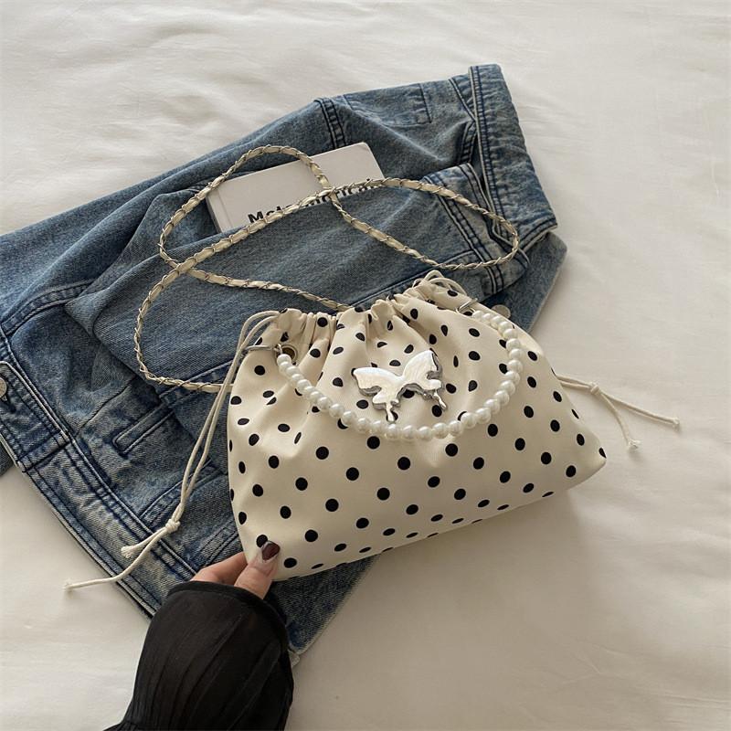 Chic And Fashionable Women s Bucket Bag In Black Pink And Cream With Unique Design Elements OffWhite
Chic And Fashionable Women s Bucket Bag In Black Pink And Cream With Unique Design Elements OffWhite