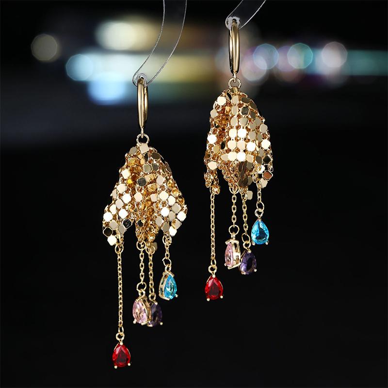 Fashionable luxury earrings for women, featuring unique colorful zircon stones, creative flared tassel drop designs, and a disti
Fashionable luxury earrings for women, featuring unique colorful zircon stones, creative flared tassel drop designs, and a disti