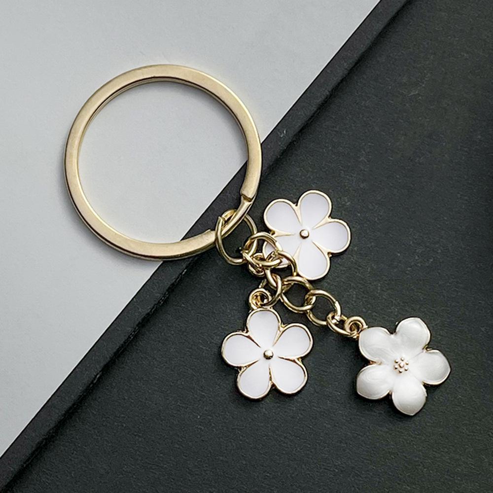 Sakura Oil Drop Keychain – Available in Black, White, Blue, Pink, Purple | Multiple Colors and Metal Parts | Luggage Accessory
Sakura Oil Drop Keychain – Available in Black, White, Blue, Pink, Purple | Multiple Colors and Metal Parts | Luggage Accessory
