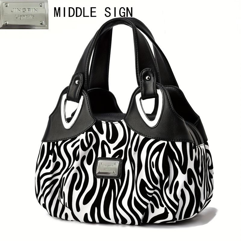 Commuter Casual Versatile Fashion Niche Design Simple Large Capacity Handbag Women
Commuter Casual Versatile Fashion Niche Design Simple Large Capacity Handbag Women