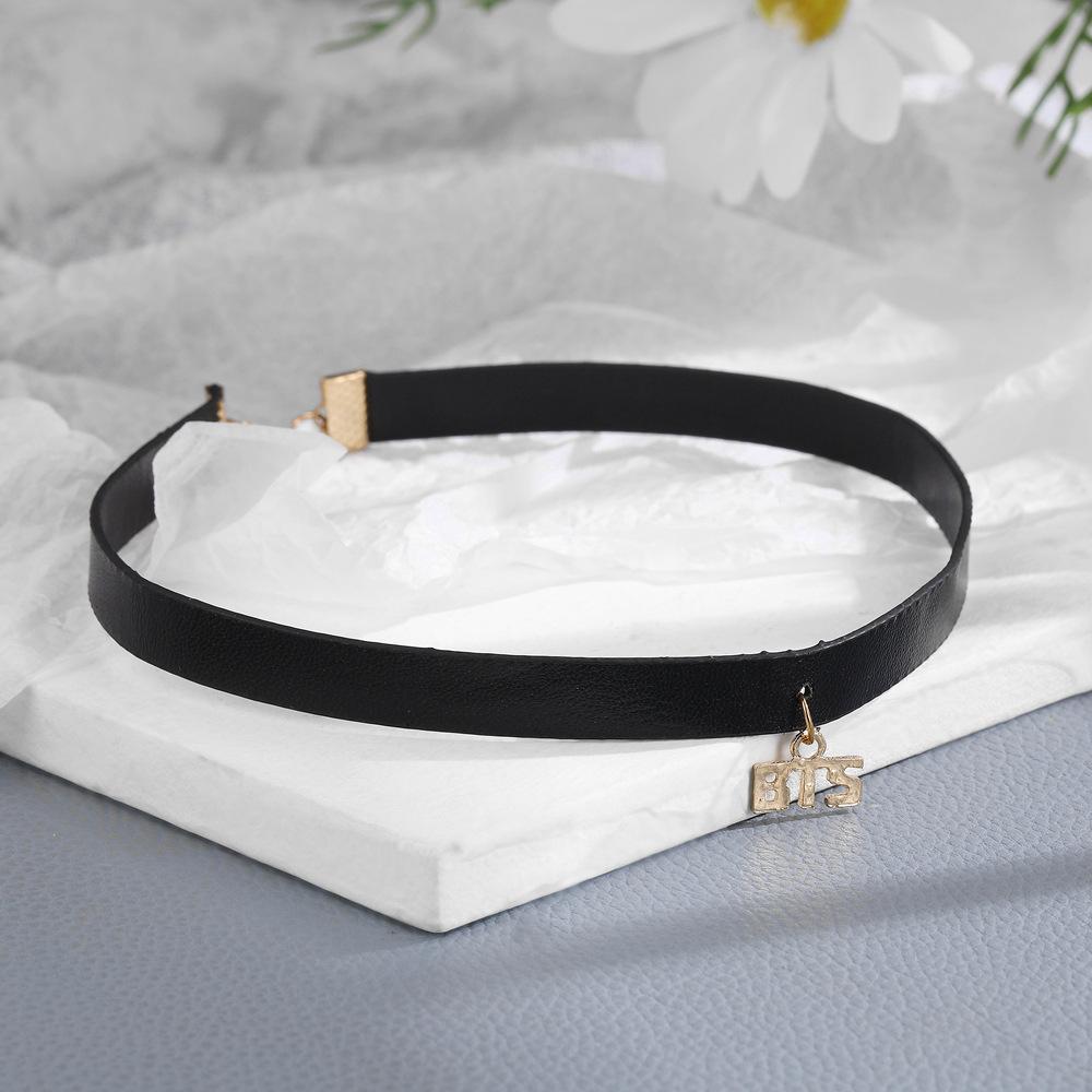 BTS Logo Black Leather Choker Necklace, Kpop Bangtan Boys Gold Letter Pendant Choker, Adjustable Chain Jewelry for ARMY Fans
BTS Logo Black Leather Choker Necklace, Kpop Bangtan Boys Gold Letter Pendant Choker, Adjustable Chain Jewelry for ARMY Fans