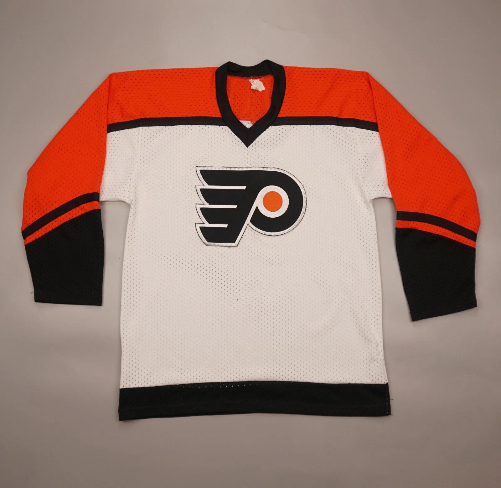 Rare Vintage Philadelphia Flyers NHL Hockey CCM Shirt Jersey Size Men Medium M L
Rare Vintage Philadelphia Flyers NHL Hockey CCM Shirt Jersey Size Men Medium M L
