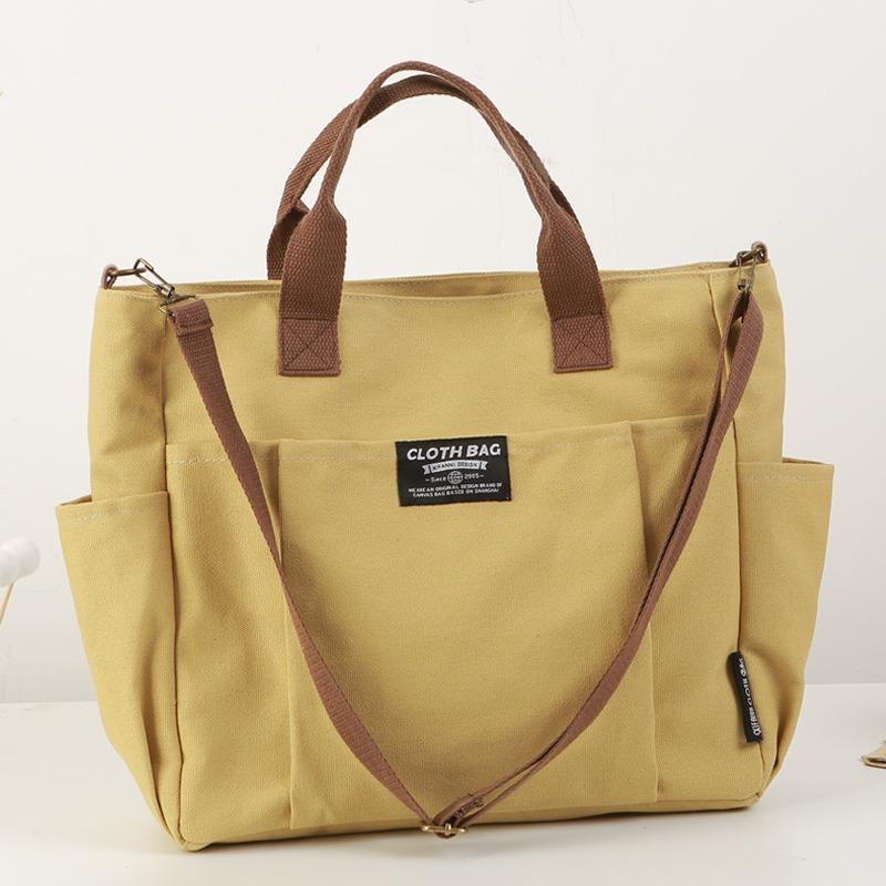 Tote Canvas Bag Thickened Multi-Pocket Japanese Leisure Student Computer Simple Portable Shoulder Crossbody School Bag Satchel темного кольору хакі
Tote Canvas Bag Thickened Multi-Pocket Japanese Leisure Student Computer Simple Portable Shoulder Crossbody School Bag Satchel темного кольору хакі