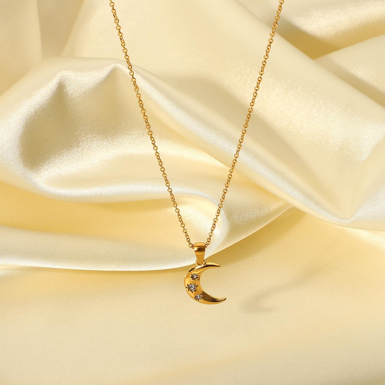 18K Gold Plated Stainless Steel Necklace Set with Triple Zircon Moon Pendants - Women s European/American Influencer Style
18K Gold Plated Stainless Steel Necklace Set with Triple Zircon Moon Pendants - Women s European/American Influencer Style