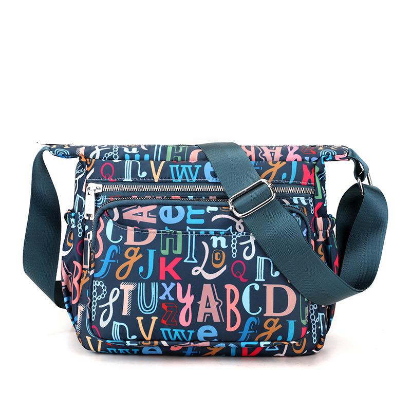 Сумка через плечо из ткани Оксфорд для женщин, весна-лето 2025 г., большая вместимость, повседневная и модная нейлоновая сумка через плечо с принтом для мам 27x31x15cm
Сумка через плечо из ткани Оксфорд для женщин, весна-лето 2025 г., большая вместимость, повседневная и модная нейлоновая сумка через плечо с принтом для мам 27x31x15cm