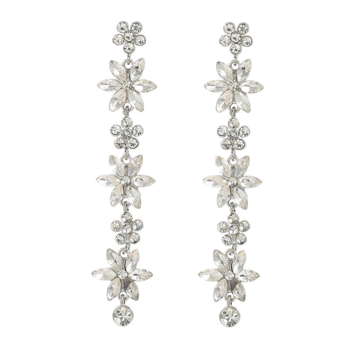 Элегантные многослойные серьги-цветы для женщин — европейский и американский стиль с цветными бриллиантами серебряный
Элегантные многослойные серьги-цветы для женщин — европейский и американский стиль с цветными бриллиантами серебряный