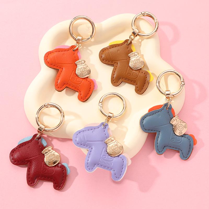 Instant Wealth Keychain: Leather Cartoon Pony Pendant & Bag Charm Duo Yellow Pony
Instant Wealth Keychain: Leather Cartoon Pony Pendant & Bag Charm Duo Yellow Pony
