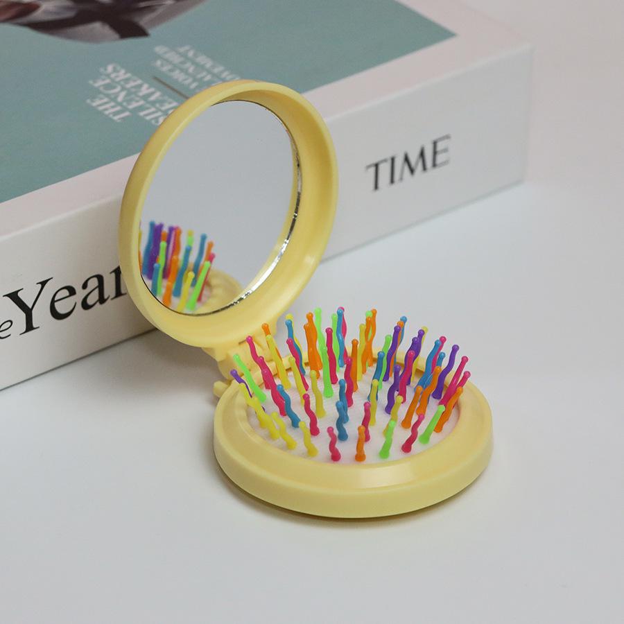 Compact Folding Comb with Mirror & Air Cushion Massage for Girls
Compact Folding Comb with Mirror & Air Cushion Massage for Girls