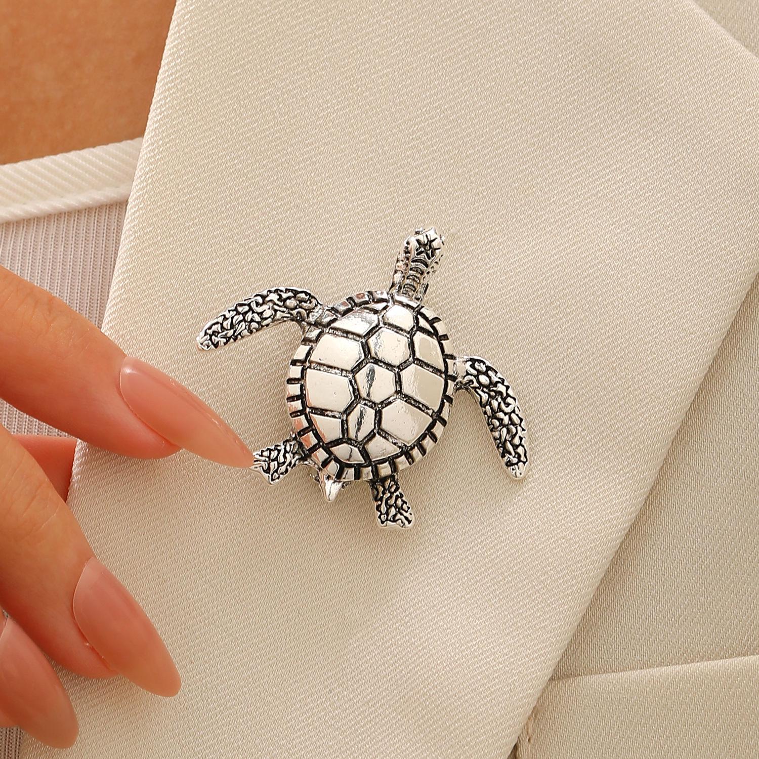 Vintage Green Turtle Brooch: Elegant Retro Accessory Pin
Vintage Green Turtle Brooch: Elegant Retro Accessory Pin