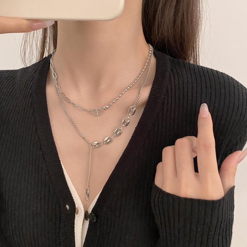 Double-Layered Pig Nose Necklace: Women s Summer Hip Hop Choker with Personality and Fashionable Clavicle Chain Design.
Double-Layered Pig Nose Necklace: Women s Summer Hip Hop Choker with Personality and Fashionable Clavicle Chain Design.