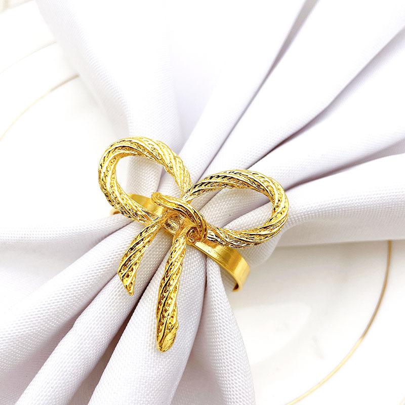8pcs/lot Simple Golden napkin ring, butterfly bow tie, metal buckle, hotel, restaurant, cloth
8pcs/lot Simple Golden napkin ring, butterfly bow tie, metal buckle, hotel, restaurant, cloth