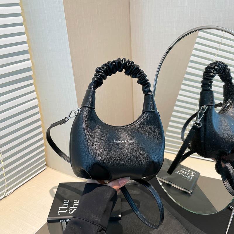 Hand carry fashion summer new simple versatile shoulder bag high sense niche trend women s dumpling bag чорний
Hand carry fashion summer new simple versatile shoulder bag high sense niche trend women s dumpling bag чорний