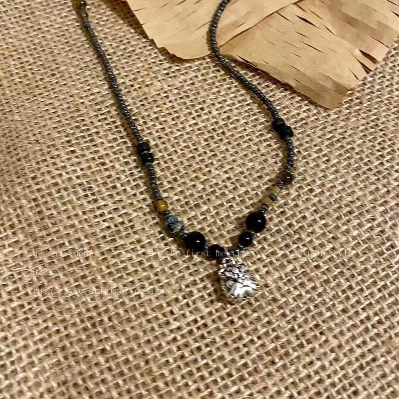 Ожерелье с подвеской в виде льва из бисера в винтажном стиле: Этнический дизайн для женщин
Ожерелье с подвеской в виде льва из бисера в винтажном стиле: Этнический дизайн для женщин