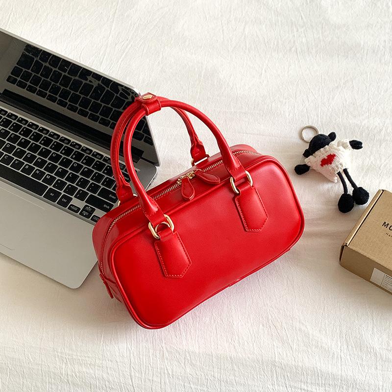 New Korean Style Niche Versatile Retro Boston Bag with High-end Commuting Temperament and Casual Shoulder Bag червоний
New Korean Style Niche Versatile Retro Boston Bag with High-end Commuting Temperament and Casual Shoulder Bag червоний