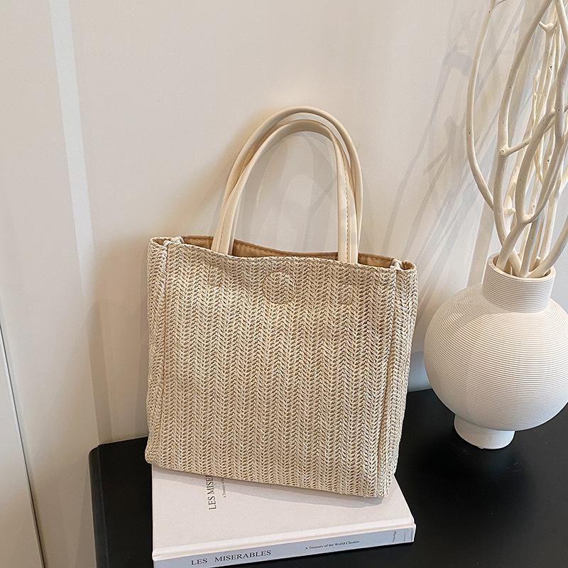 Summer new woven women s large-capacity portable tote bag popular casual shoulder underarm bag seaside bag хаки
Summer new woven women s large-capacity portable tote bag popular casual shoulder underarm bag seaside bag хаки