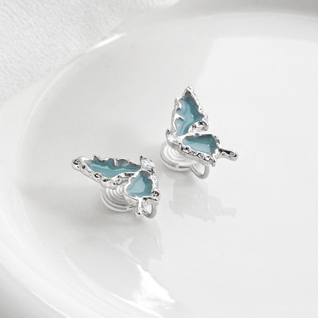 Elegant Blue Drip Butterfly Ear Clips for Women - Non-Pierced, Fashionable Mosquito Coil Design
Elegant Blue Drip Butterfly Ear Clips for Women - Non-Pierced, Fashionable Mosquito Coil Design