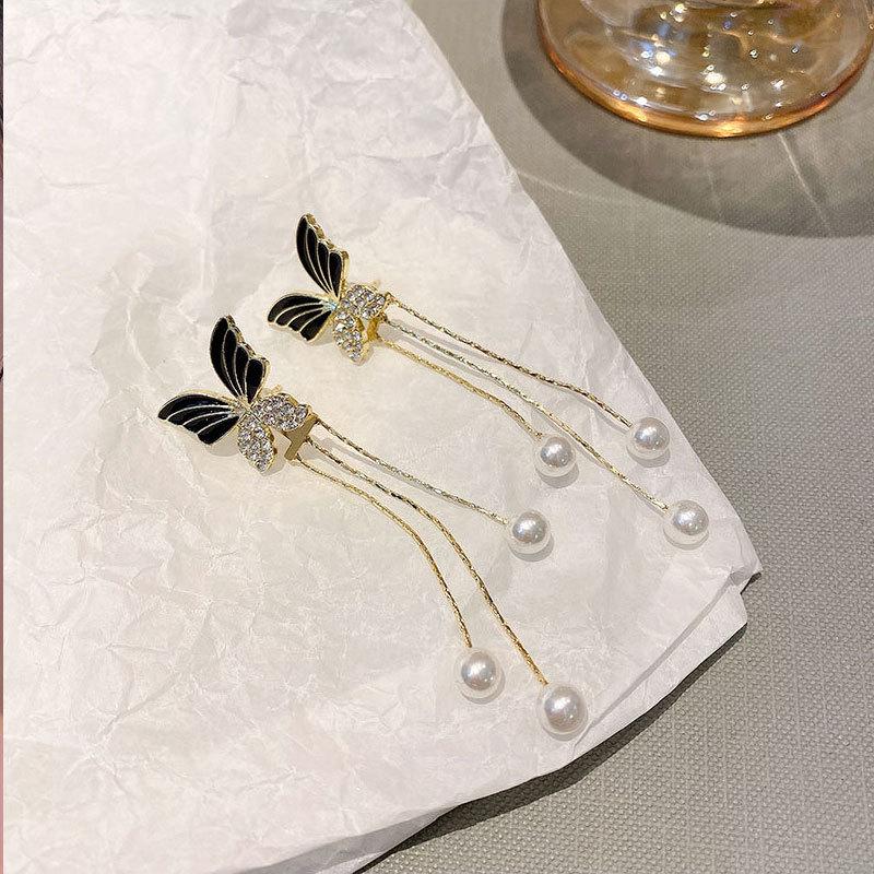 Elegant Retro Black Butterfly Tassel Earrings: Women s Versatile Long Pearl Dangle Jewelry
Elegant Retro Black Butterfly Tassel Earrings: Women s Versatile Long Pearl Dangle Jewelry