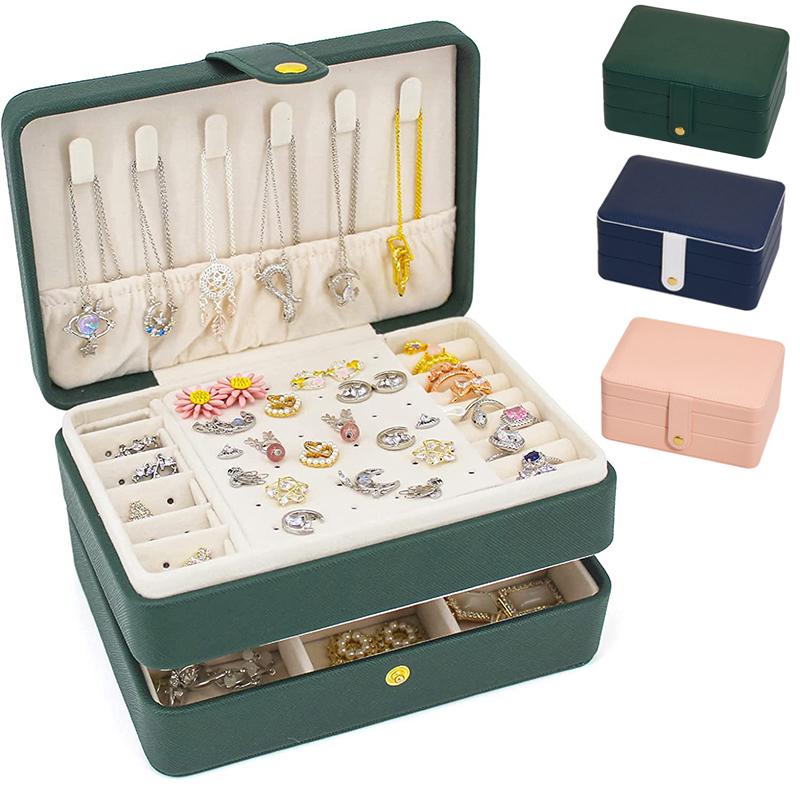 Двухслойная шкатулка для драгоценностей Зеленые практичные серьги Ожерелья Дисплей Высококачественный органайзер для ювелирных изделий из искусственной кожи для женщин
Двухслойная шкатулка для драгоценностей Зеленые практичные серьги Ожерелья Дисплей Высококачественный органайзер для ювелирных изделий из искусственной кожи для женщин