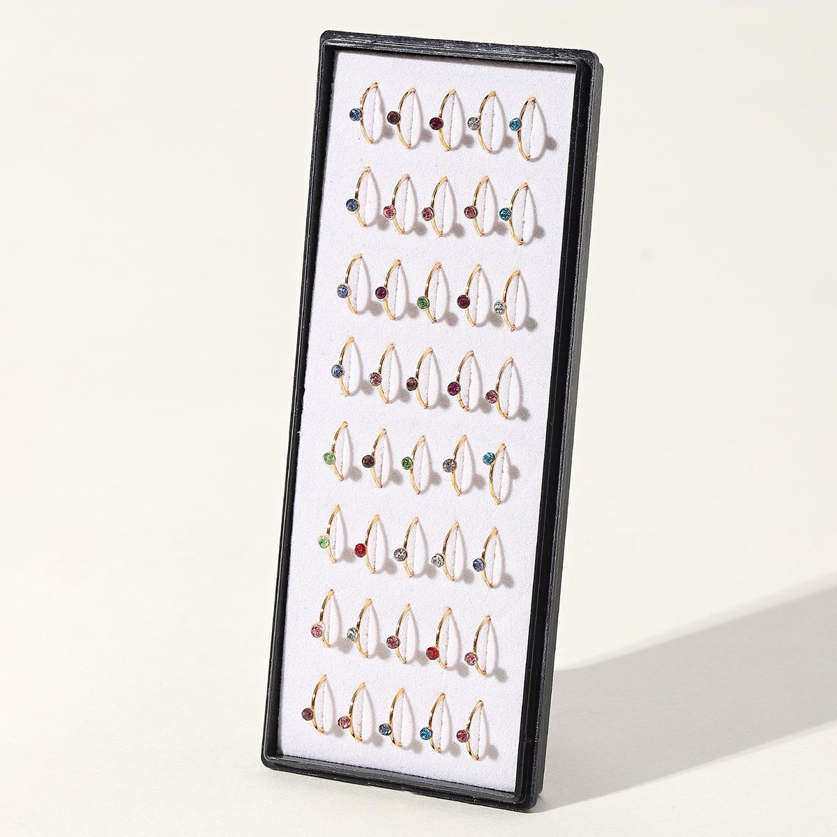 Позолоченные кольца для носа из нержавеющей стали со стразами - 40 штук Ring Diameter ~8mm, Rhinestone ~2mm
Позолоченные кольца для носа из нержавеющей стали со стразами - 40 штук Ring Diameter ~8mm, Rhinestone ~2mm