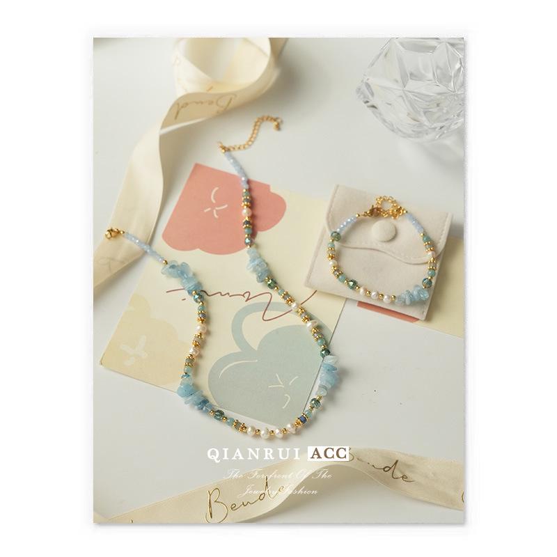 Aquamarine Pearl Bracelet & Necklace Set: Natural Stone Irregular Glacier Jewelry, High-End Summer Healing Collection.
Aquamarine Pearl Bracelet & Necklace Set: Natural Stone Irregular Glacier Jewelry, High-End Summer Healing Collection.
