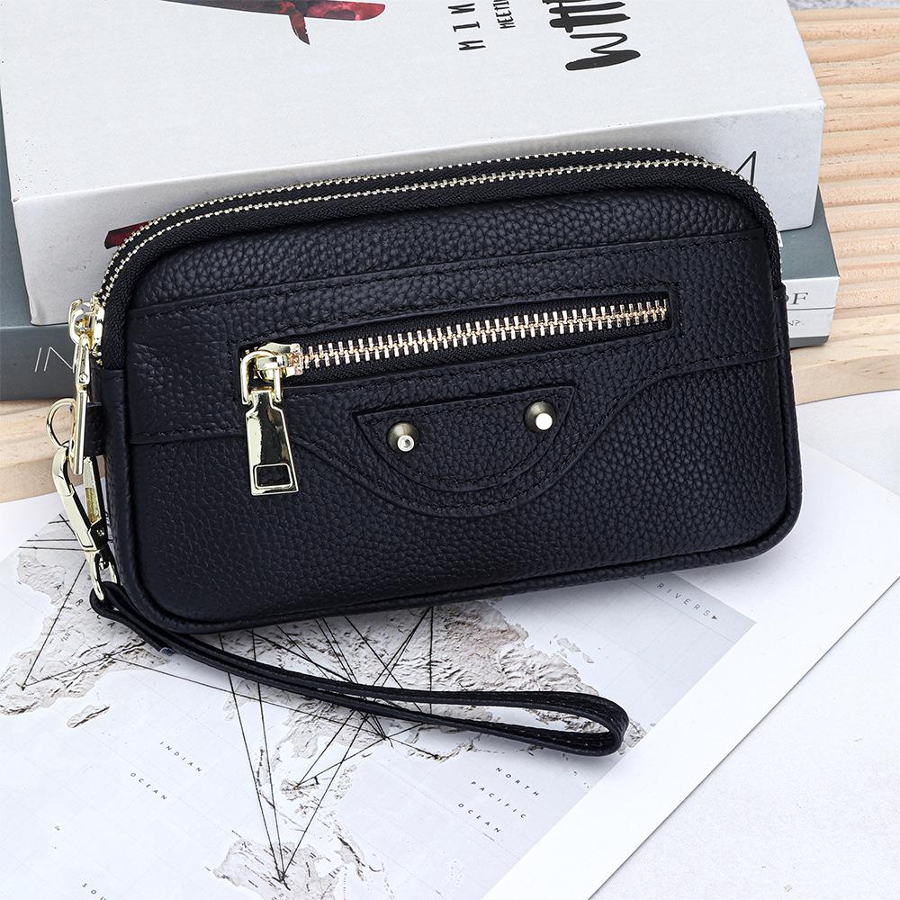 Women s Genuine Leather Motorcycle Style Clutch Bag with Double Zipper for Phone Storage, Top Layer Cowhide Handbag.
Women s Genuine Leather Motorcycle Style Clutch Bag with Double Zipper for Phone Storage, Top Layer Cowhide Handbag.