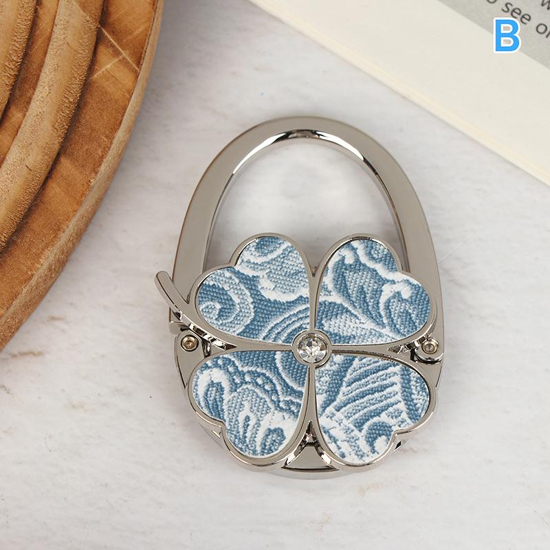 Модный Крючок для Сумки Складные Цветы Вешалка для Кошелька Портативное Хранение Сумок Для Помещения На Улице Крючок на Стол
Модный Крючок для Сумки Складные Цветы Вешалка для Кошелька Портативное Хранение Сумок Для Помещения На Улице Крючок на Стол