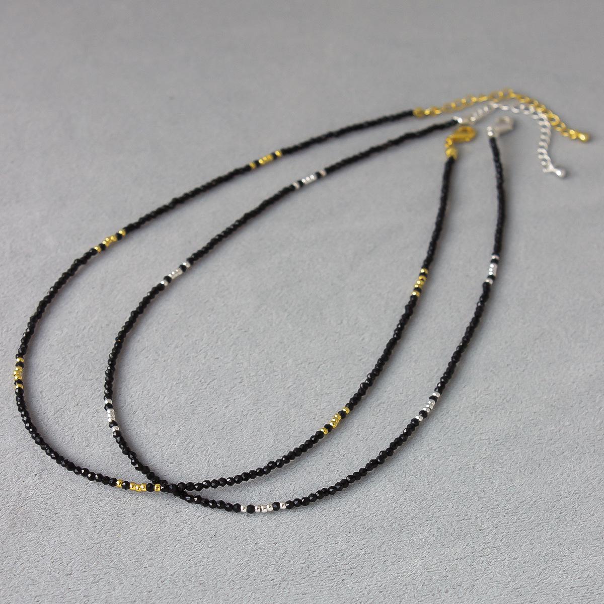 Korean Blogger Style: Elegant Gold and Black Bead Choker Necklace, Dainty and Shiny for a Chic Layered Look.
Korean Blogger Style: Elegant Gold and Black Bead Choker Necklace, Dainty and Shiny for a Chic Layered Look.