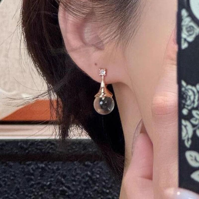 Vintage glossy round beads earring stud unique trend casualness fashion white crystal earrings for women banquet jewelry
Vintage glossy round beads earring stud unique trend casualness fashion white crystal earrings for women banquet jewelry