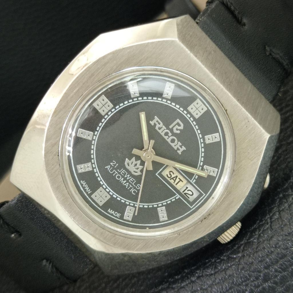 VINTAGE RICOH R31 AUTOMATIC JAPAN MENS BLACK COLOR DIAL WATCH a707944-1
VINTAGE RICOH R31 AUTOMATIC JAPAN MENS BLACK COLOR DIAL WATCH a707944-1