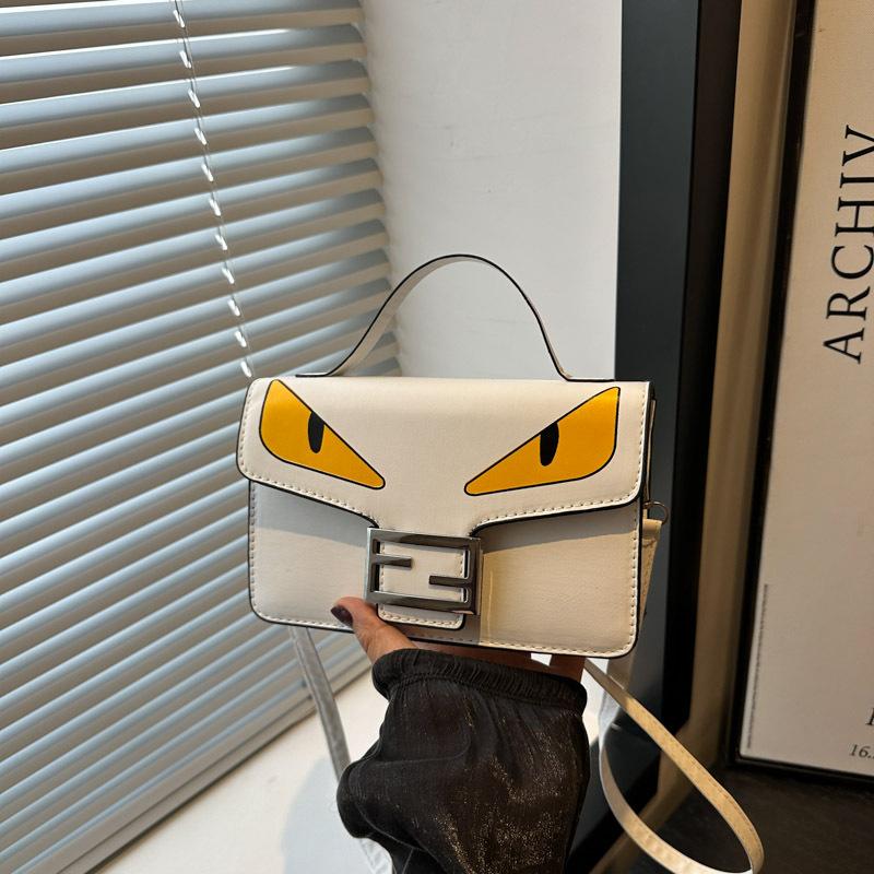 Trend design cartoon printing fashion niche versatile small square bag contrasting colors popular portable shoulder messenger bag білий
Trend design cartoon printing fashion niche versatile small square bag contrasting colors popular portable shoulder messenger bag білий