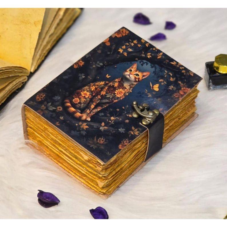 Handmade Vintage Cat Journal – Leather Notebook with Floral Cat Art & Aged Deckle Edge Pages – Witchy Grimoire Journal - Book of Shadows 7 x 5 in
Handmade Vintage Cat Journal – Leather Notebook with Floral Cat Art & Aged Deckle Edge Pages – Witchy Grimoire Journal - Book of Shadows 7 x 5 in