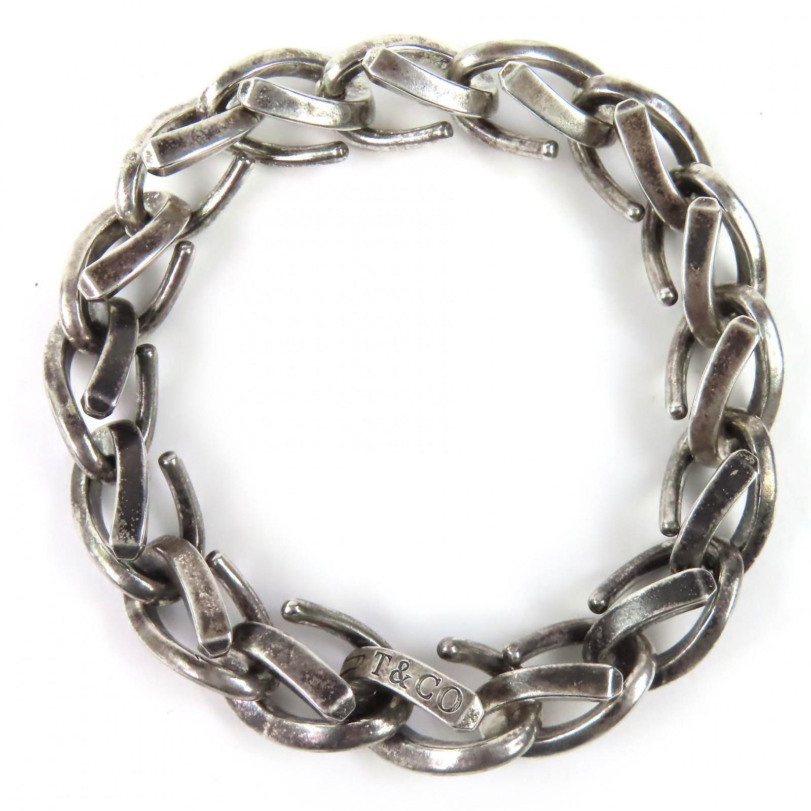 Відмінний TIFFANY&Co. Кований Браслет з Великими Ланками 16-ланковий Копчений 925 Використаний
Відмінний TIFFANY&Co. Кований Браслет з Великими Ланками 16-ланковий Копчений 925 Використаний