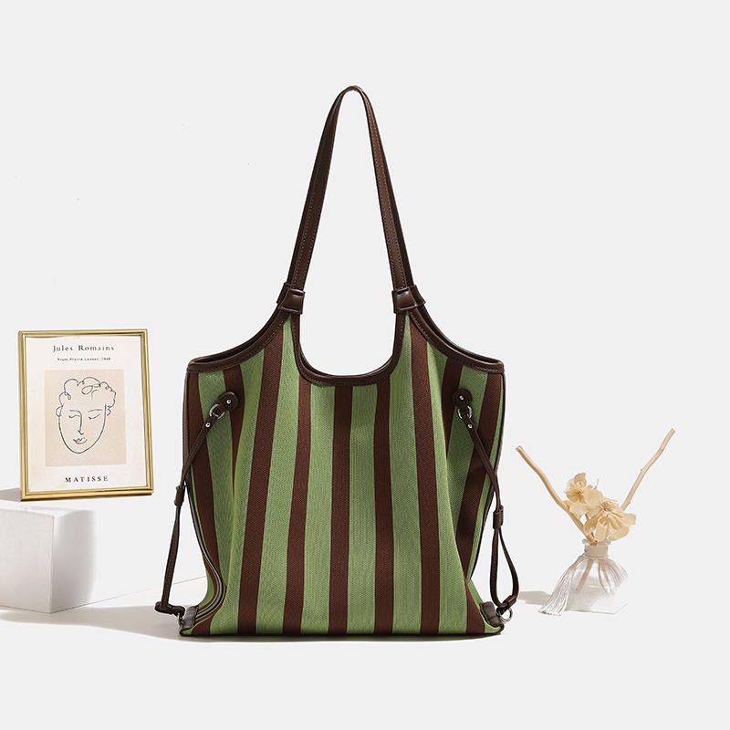 Hong Kong Brand Fashion Canvas Bag Female 2025 New Arrival Underarm Bag Versatile Large Capacity Commuter Tote Green
Hong Kong Brand Fashion Canvas Bag Female 2025 New Arrival Underarm Bag Versatile Large Capacity Commuter Tote Green