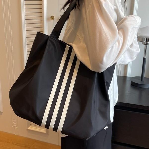 New large-capacity simple women s bag nylon cloth fashionable versatile handbag women s lightweight tote bag
New large-capacity simple women s bag nylon cloth fashionable versatile handbag women s lightweight tote bag