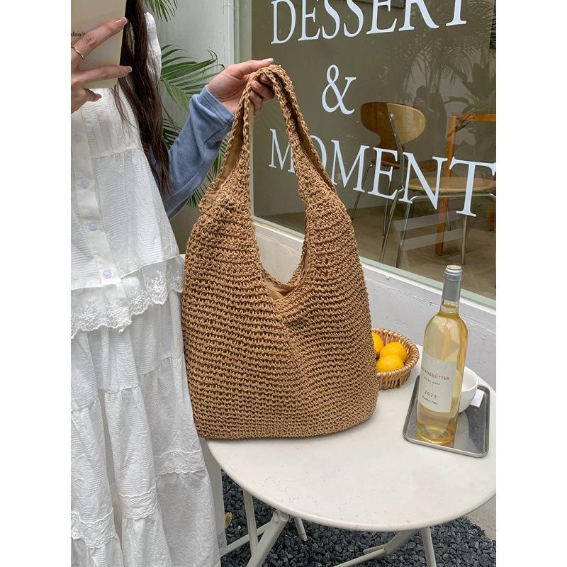 New Vacation Style Grass Woven Bag Shoulder Bag New Tote Bag Large Capacity Casual Hand-held Woven Bag Ethnic Style коричневий
New Vacation Style Grass Woven Bag Shoulder Bag New Tote Bag Large Capacity Casual Hand-held Woven Bag Ethnic Style коричневий