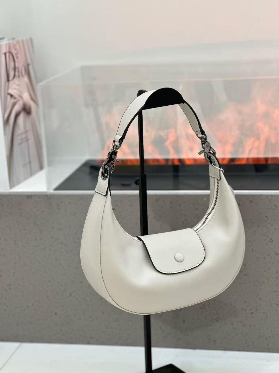 One-shoulder Cross-body Bag Casual Fashionable Dumpling Genuine Leather Women s Niche All-matching Underarm Length: 25 cm, bottom width: 8 cm білий
One-shoulder Cross-body Bag Casual Fashionable Dumpling Genuine Leather Women s Niche All-matching Underarm Length: 25 cm, bottom width: 8 cm білий